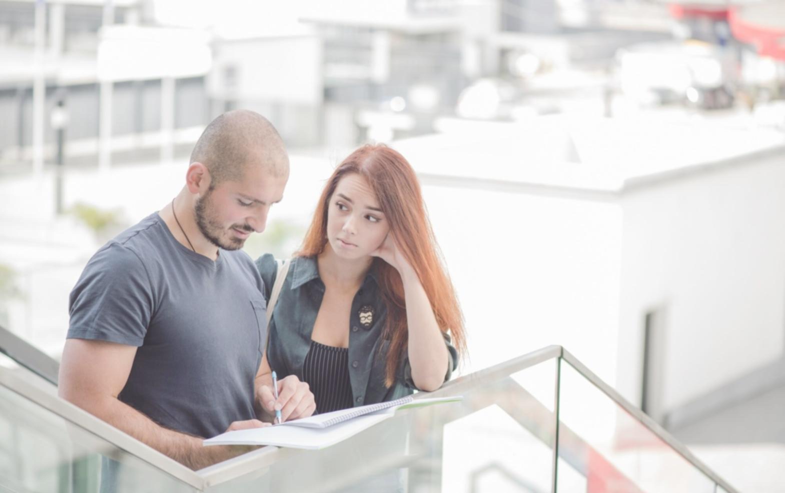 Business professionals reviewing competitive market data